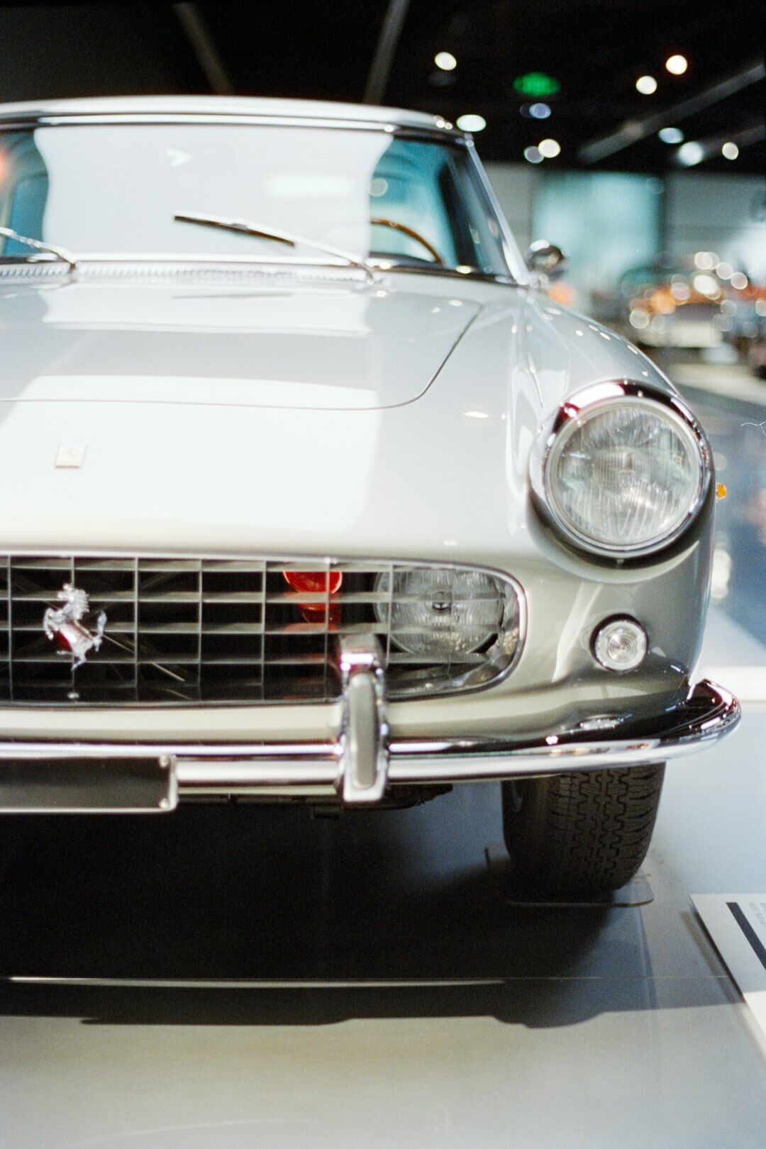 Close up of a vintage Ferrari front grille and badge