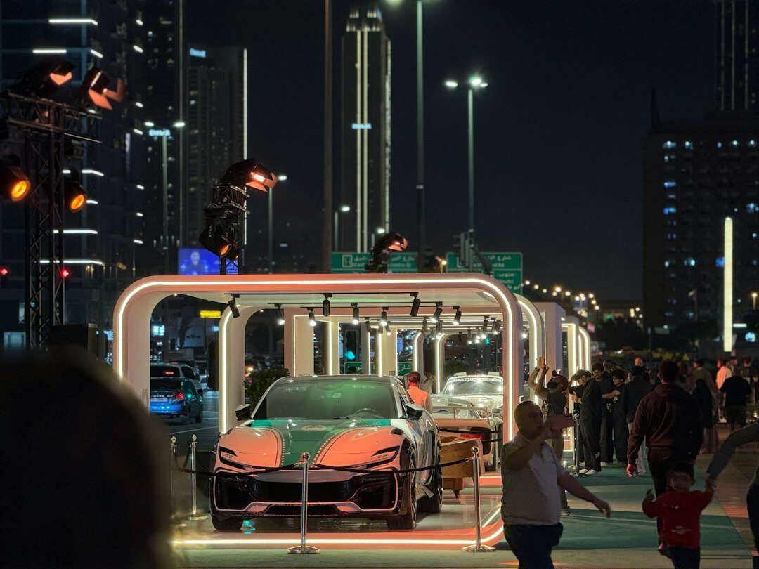 Modern hypercar showcase event at night in Montevideo